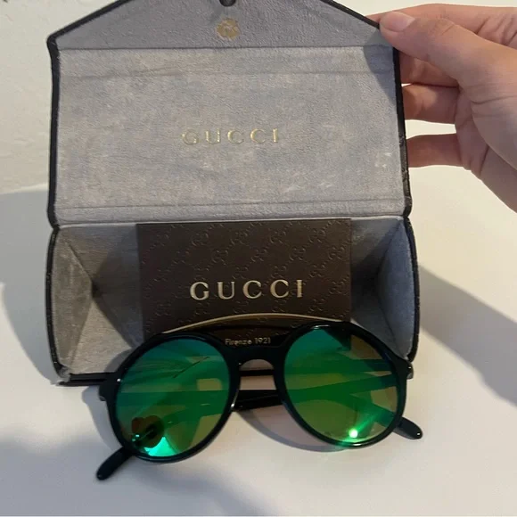 GUCCI - round black frames on polarized green lens Gucci GG1862S Cat Eye Sunglasses | Fashion Eyewear US main image 4